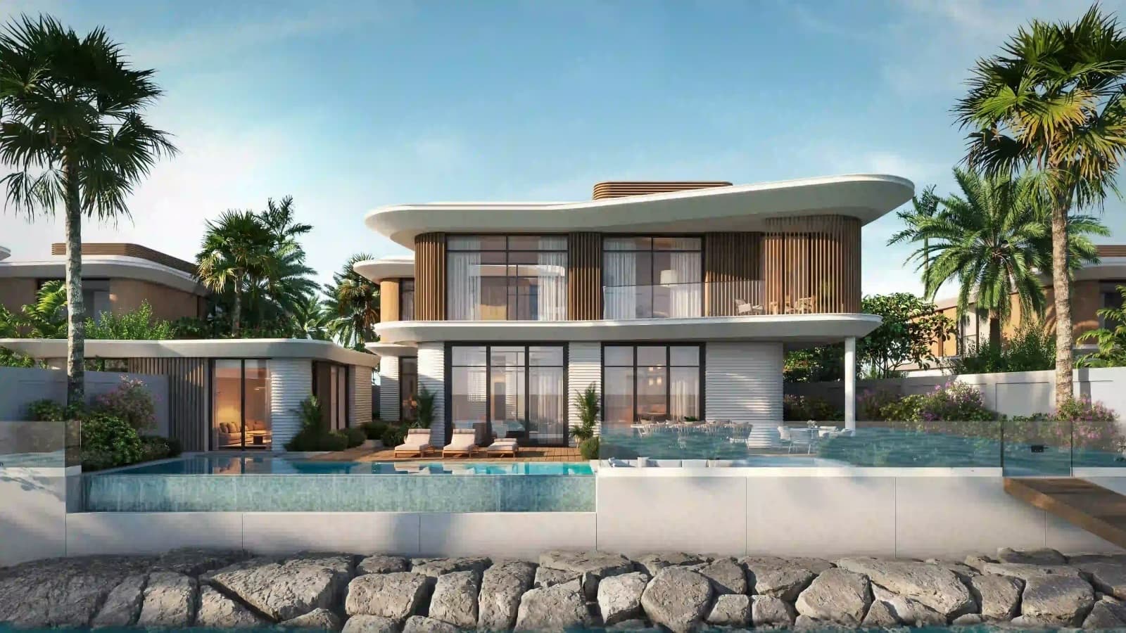 A waterfront villa at Yas Riva Reserve with its pool on the waterway